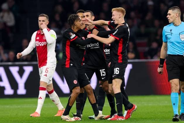 2025-03-06 AFC Ajax v Eintracht Frankfurt - UEFA Europa League 2024 25 Round of 16 First Leg AMSTERDAM, NETHERLANDS - MARCH 6: Ellyes Skhiri of Eintracht Frankfurt, Hugo Larsson of Eintracht Frankfurt, Tuta, Jean-Matteo Bahoya of Eintracht Frankfurt celebrates after scoring the first goal of the team during the UEFA Europa League 2024 25 Round of 16 First Leg match between AFC Ajax and Eintracht Frankfurt at Johan Cruijff ArenA on March 6, 2025 in Amsterdam, Netherlands. Amsterdam Johan Cruijff ArenA Netherlands Content not available for redistribution in The Netherlands directly or indirectly through any third parties. Copyright: xHansxvanxderxValkx