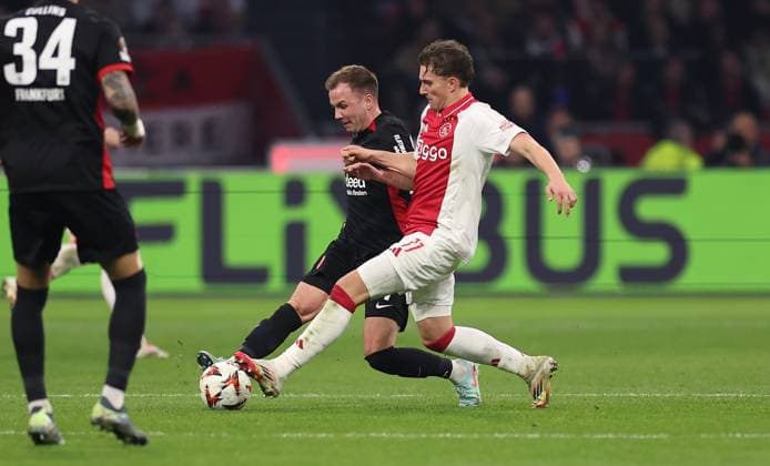 06 03 2025, Football UEFA Europa League, AFC Ajax Amsterdam Eintracht Frankfurt, emonline, emspor, v l , Mario Götze Eintracht Frankfurt , Mika Godts Ajax Amsterdam DFL DFB REGULATIONS PROHIBIT ANY USE OF PHOTOGRAPHS AS IMAGE SEQUENCES AND OR QUASI VIDEO xdcx Copyright: HMBxMedia Claus