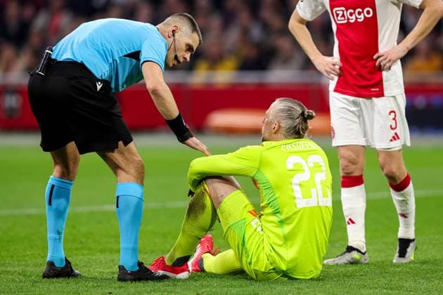 2025-03-06 AFC Ajax v Eintracht Frankfurt - UEFA Europa League 2024 25 Round of 16 First Leg AMSTERDAM, NETHERLANDS - MARCH 6: goalkeeper Remko Pasveer of AFC Ajax injured, Referee Simone Sozza during to the UEFA Europa League 2024 25 Round of 16 First Leg match between AFC Ajax and Eintracht Frankfurt at Johan Cruijff ArenA on March 6, 2025 in Amsterdam, Netherlands. Amsterdam Johan Cruijff ArenA Netherlands Content not available for redistribution in The Netherlands directly or indirectly through any third parties. Copyright: xBenxGalx