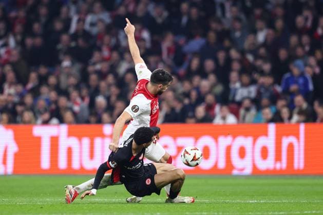 AMSTERDAM, 06-03-2025 , JohanCruyff Arena , UEFA Europa League Football season 2024 2025 , match between Ajax and Eintracht Frankfurt. (L-R) Ajax player Josip Sutalo, Eintracht Frankfurt player Hugo Ekitike Ajax - Eintracht Frankfurt  x28191518x Copyright: