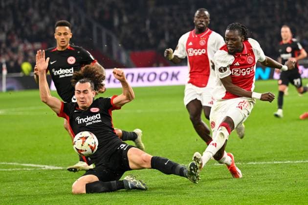 Amsterdam, Johan Cruijff Arena, 06 03 25, NLD, Men, UEFA Europa League, Season 2024 2025, Ajax Amsterdam Eintracht Frankfurt Picture from left in duel Arthur THEATE Frankfurt and Brian BROBBEY Ajax UEFA regulations prohibit any use of photographs as image sequences and or quasi video North Holland Netherlands