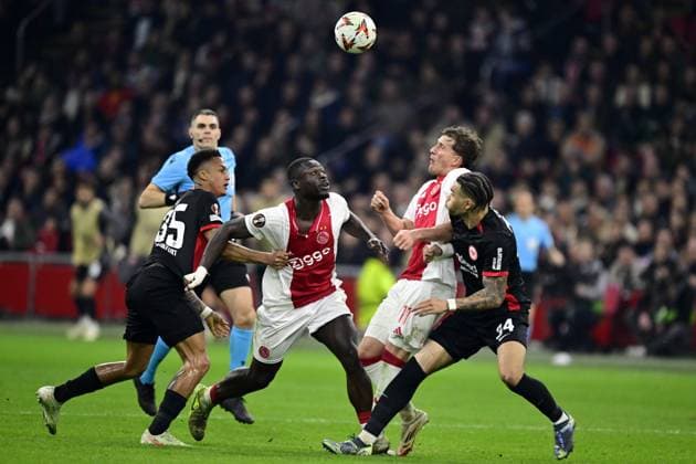 AMSTERDAM - (l-r) Tuta of Eintracht Frankfurt, Brian Brobbey of Ajax, Mika Godts of Ajax, Nnamdi Collins of Eintracht Frankfurt during the UEFA Europa League match between AFC Ajax and Eintracht Frankfurt at the Johan Cruijff ArenA on March 6, 2025 in Amsterdam, Netherlands. ANP OLAF CRACK UEFA Europa League 2024 25 Round of 16 First Leg 2024 25 xVIxANPxSportx xxANPxIVx 521726924 originalFilename: 521726924.jpg