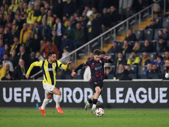 Nicolas Raskin of Rangers in action with Ifran Can Kahveci of Fenerbahce during the Europa League last 16 match at the Sükrü Saracoglu Stadium, Istanbul. Fenerbahce v Rangers, UEFA Europa League, Football, Sukru Saracoglu Stadium, Istanbul, Turkey - 06 Mar 2025 EDITORIAL USE ONLY No use with unauthorised audio, video, data, fixture lists, club league logos or live services. Online in-match use limited to 120 images, no video emulation. No use in betting, games or single club league player publications. Copyright: xO Rourke RangersxFC Shutterstockx 15182250ja