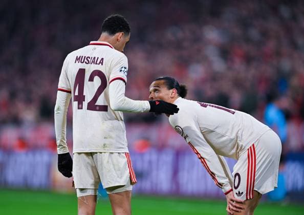 Leroy Sane FC Bayern Muenchen speaks to Jamal Musiala FC Bayern Muenchen during the UEFA Champions League 2024 25 Round of 16 First Leg match between FC Bayern München and Bayer 04 Leverkusen at Allianz Arena on March 5, 2025 in Munich, Germany Photo by Silas Schueller DeFodi Images