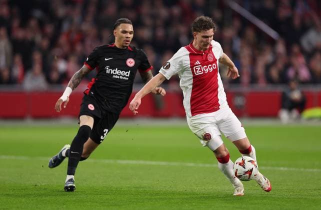 06 03 2025, Football UEFA Europa League, AFC Ajax Amsterdam Eintracht Frankfurt, emonline, emspor, v l , Pharell Nnamdi Collins Eintracht Frankfurt , Mika Godts Ajax Amsterdam DFL DFB REGULATIONS PROHIBIT ANY USE OF PHOTOGRAPHS AS IMAGE SEQUENCES AND OR QUASI VIDEO xdcx Copyright: HMBxMedia Claus