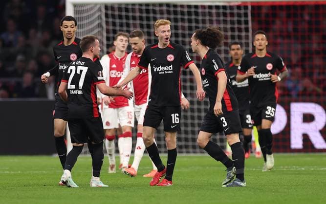 06 03 2025, Football UEFA Europa League, AFC Ajax Amsterdam Eintracht Frankfurt, emonline, emspor, v l , Goal celebration to 1 1 by Hugo Larsson Eintracht Frankfurt , Mario Götze Eintracht Frankfurt , Arthur Theate Eintracht Frankfurt , Goal celebration, celebrate the goal DFL DFB REGULATIONS PROHIBIT ANY USE OF PHOTOGRAPHS AS IMAGE SEQUENCES AND OR QUASI VIDEO xdcx Copyright: HMBxMedia Claus