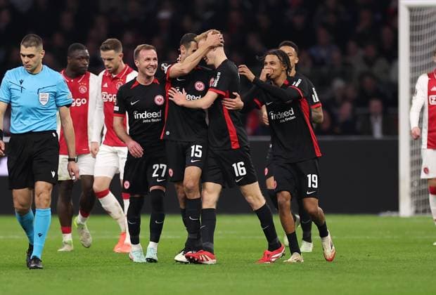 06 03 2025, Football UEFA Europa League, AFC Ajax Amsterdam Eintracht Frankfurt, emonline, emspor, v l , Goal celebration to 1 1 by Hugo Larsson Eintracht Frankfurt , Mario Götze Eintracht Frankfurt , Arthur Theate Eintracht Frankfurt , Goal celebration, celebrate the goal DFL DFB REGULATIONS PROHIBIT ANY USE OF PHOTOGRAPHS AS IMAGE SEQUENCES AND OR QUASI VIDEO xdcx Copyright: HMBxMedia Claus