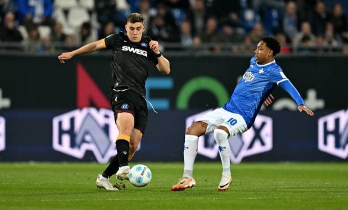 07.03.2025, xfux, Fussball 2.Bundesliga, SV Darmstadt 98 - Karlsruher SC v.l. Marcel Beifus (Karlsruher SC, KSC), Jean-Paul BoÃ«tius Boetius (SV Darmstadt 98) (DFL DFB REGULATIONS PROHIBIT ANY USE OF PHOTOGRAPHS as IMAGE SEQUENCES and or QUASI-VIDEO. Eine Lizenzierung dieses Bildes an und oder durch den SV Darmstadt 1898 e.V. sowie Tochterunternehmen ist nicht gestattet. No release of or sale to SV Darmstadt 1898 e.V.) Darmstadt