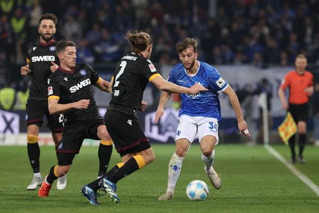 2025 03 07 xJFx 2 Bundesliga SV Darmstadt 98 Karlsruher SC v l , Nicolai Rapp Karlsruher SC , Sebastian Jung Karlsruher SC , Kilian Julian Corredor SV Darmstadt 98 Zweikampf, Action, Aktion, Battles for the Ball DFL DFB REGULATIONS PROHIBIT ANY USE OF PHOTOGRAPHS as IMAGE SEQUENCES and or QUASI VIDEO Copyright: JoaquimxFerreira