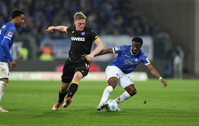 07 03 2025, xdcx, Soccer 2 Bundesliga, SV Darmstadt 98 Karlsruher SC, emonline, emspor, despor, v l , Mikkel Kaufmann Karlsruher SC , Merveille Papela SV Darmstadt 98 DFL DFB REGULATIONS PROHIBIT ANY USE OF PHOTOGRAPHS AS IMAGE SEQUENCES AND OR QUASI VIDEO Copyright: HMBxMedia Claus