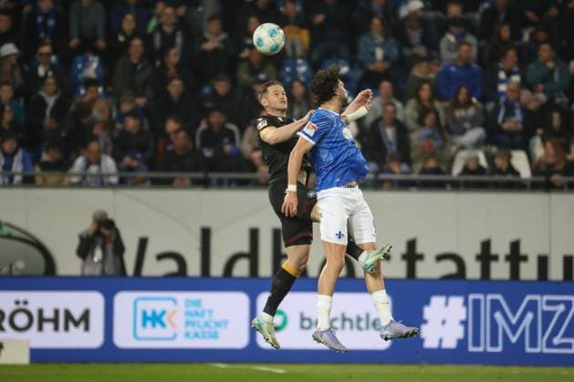 Darmstadt, Germany 07 March 2025 2 Liga 2024 2025 SV Darmstadt 98 vs Karlsruher SC In picture from left in duel Christoph Kobald Karlsruher SC, 22 , Fraser Hornby Darmstadt, 9 , DFL regulations prohibit any use of photographs as image sequences and or quasi video Merck Stadion am Böllenfalltor Hessen Copyright: xFotostandx xUlrichxScherbaumx
