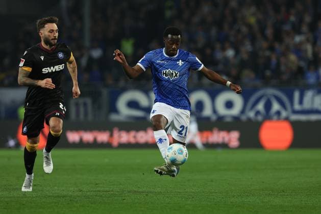 2025 03 07 xJFx 2 Bundesliga SV Darmstadt 98 Karlsruher SC v l , Fabian Schleusener Karlsruher SC , Matondo Merveille Papela SV Darmstadt 98 , in aktion, in action, DFL DFB REGULATIONS PROHIBIT ANY USE OF PHOTOGRAPHS as IMAGE SEQUENCES and or QUASI VIDEO Copyright: JoaquimxFerreira