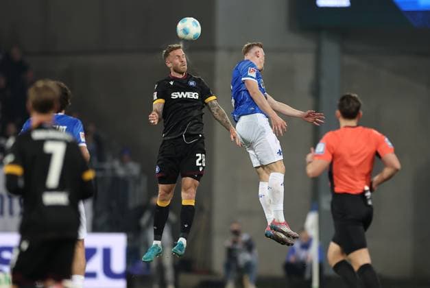 07 03 2025, xdcx, Soccer 2 Bundesliga, SV Darmstadt 98 Karlsruher SC, emonline, emspor, despor, v l , Marcel Franke Karlsruher SC , Isac Lidberg SV Darmstadt 98 DFL DFB REGULATIONS PROHIBIT ANY USE OF PHOTOGRAPHS AS IMAGE SEQUENCES AND OR QUASI VIDEO Copyright: HMBxMedia Claus