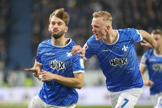 Darmstadt, Germany 07 March 2025 2 Liga 2024 2025 SV Darmstadt 98 vs Karlsruher SC In the picture from left goal scorer Killian Corredor Darmstadt, 34 , cheers after his goal for 2 0 in the 73rd minute of the match with Isac Lidberg Darmstadt, 7 , goal celebration, DFL regulations prohibit any use of photographs as image sequences and or quasi video Merck Stadion am Böllenfalltor Hessen Copyright: xFotostandx xUlrichxScherbaumx