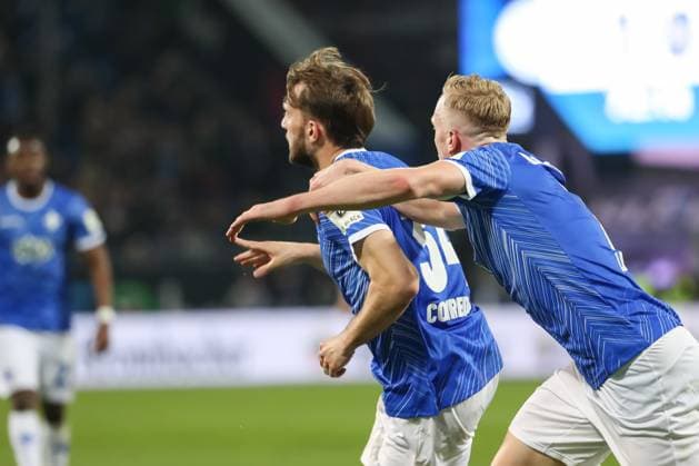 Darmstadt, Germany 07 March 2025 2 Liga 2024 2025 SV Darmstadt 98 vs Karlsruher SC In the picture from left goal scorer Killian Corredor Darmstadt, 34 cheers after his goal to 2 0 with Isac Lidberg Darmstadt, 7 in the 73rd minute of the match DFL regulations prohibit any use of photographs as image sequences and or quasi video Merck Stadion am Böllenfalltor Hessen Copyright: xFotostandx xUlrichxScherbaumx