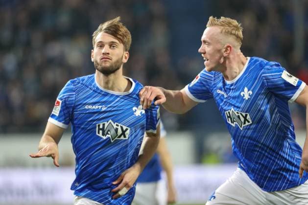 Darmstadt, Germany 07 March 2025 2 Liga 2024 2025 SV Darmstadt 98 vs Karlsruher SC In the picture from left goal scorer Killian Corredor Darmstadt, 34 cheers after his goal to 2 0 with Isac Lidberg Darmstadt, 7 in the 73rd minute of the match DFL regulations prohibit any use of photographs as image sequences and or quasi video Merck Stadion am Böllenfalltor Hessen Copyright: xFotostandx xUlrichxScherbaumx