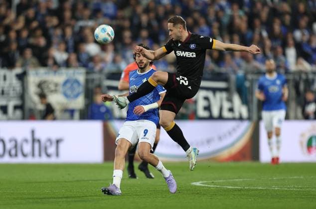 07 03 2025, xdcx, Soccer 2 Bundesliga, SV Darmstadt 98 Karlsruher SC, emonline, emspor, despor, v l , Fraser Hornby SV Darmstadt 98 , Christoph Kobald Karlsruher SC DFL DFB REGULATIONS PROHIBIT ANY USE OF PHOTOGRAPHS AS IMAGE SEQUENCES AND OR QUASI VIDEO Copyright: HMBxMedia Claus