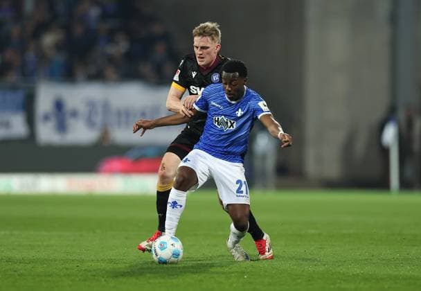 07 03 2025, xdcx, Soccer 2 Bundesliga, SV Darmstadt 98 Karlsruher SC, emonline, emspor, despor, v l , Mikkel Kaufmann Karlsruher SC , Merveille Papela SV Darmstadt 98 DFL DFB REGULATIONS PROHIBIT ANY USE OF PHOTOGRAPHS AS IMAGE SEQUENCES AND OR QUASI VIDEO Copyright: HMBxMedia Claus