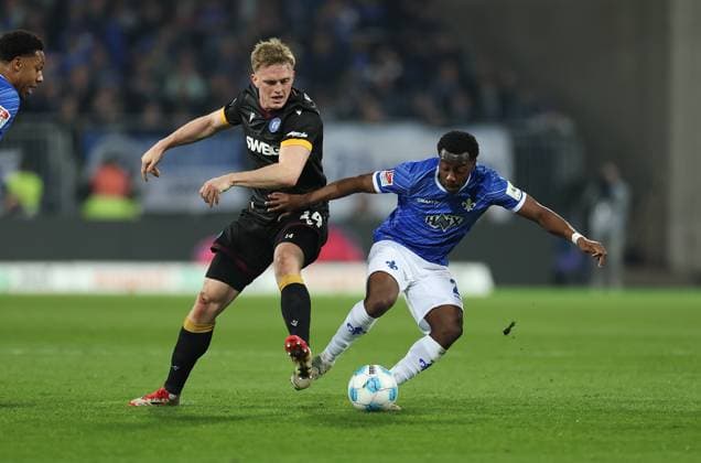 07 03 2025, xdcx, Soccer 2 Bundesliga, SV Darmstadt 98 Karlsruher SC, emonline, emspor, despor, v l , Mikkel Kaufmann Karlsruher SC , Merveille Papela SV Darmstadt 98 DFL DFB REGULATIONS PROHIBIT ANY USE OF PHOTOGRAPHS AS IMAGE SEQUENCES AND OR QUASI VIDEO Copyright: HMBxMedia Claus