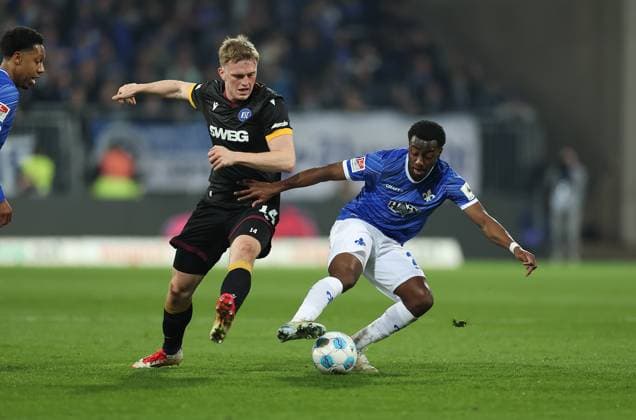 07 03 2025, xdcx, Soccer 2 Bundesliga, SV Darmstadt 98 Karlsruher SC, emonline, emspor, despor, v l , Mikkel Kaufmann Karlsruher SC , Merveille Papela SV Darmstadt 98 DFL DFB REGULATIONS PROHIBIT ANY USE OF PHOTOGRAPHS AS IMAGE SEQUENCES AND OR QUASI VIDEO Copyright: HMBxMedia Claus