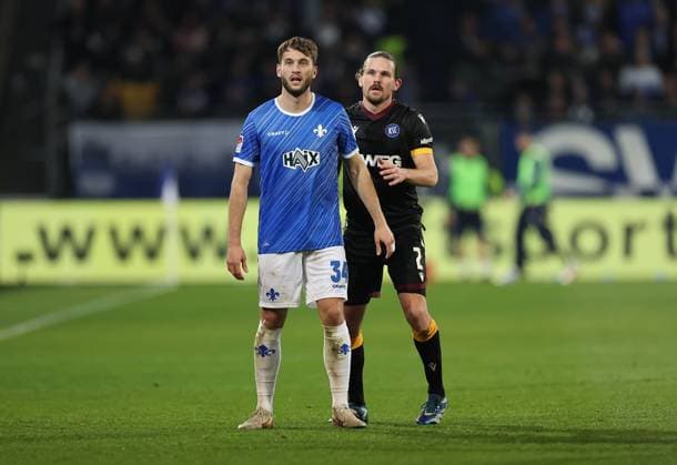 07 03 2025, xdcx, Soccer 2 Bundesliga, SV Darmstadt 98 Karlsruher SC, emonline, emspor, despor, v l , Killian Corredor SV Darmstadt 98 , Sebastian Jung Karlsruher SC DFL DFB REGULATIONS PROHIBIT ANY USE OF PHOTOGRAPHS AS IMAGE SEQUENCES AND OR QUASI VIDEO Copyright: HMBxMedia Claus