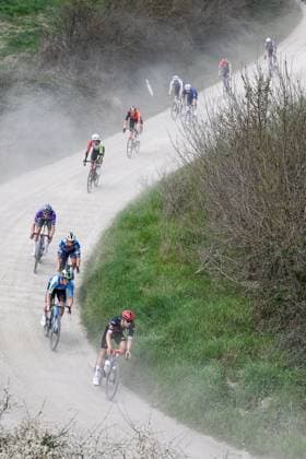 Swiss Fabian Weiss of Tudor Pro Cycling Team, Belgian Stan Dewulf of Decathlon AG2R La Mondiale Team and Dutch Pepijn Reinderink of Soudal Quick-Step pictured in action during the men elite Strade Bianche one day cycling race, 213km from and to Siena, Italy on Saturday 08 March 2025. DIRKxWAEM  x114493301x
