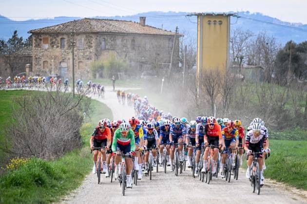 The pack of riders pictured in action during the men elite Strade Bianche one day cycling race, 213km from and to Siena, Italy on Saturday 08 March 2025. DIRKxWAEM  x114494148x