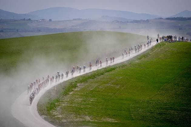 The pack of riders pictured in action during the men elite Strade Bianche one day cycling race, 213km from and to Siena, Italy on Saturday 08 March 2025. DIRKxWAEM  x114494397x