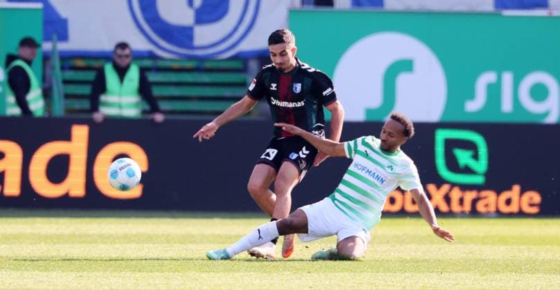 Fürth, 08 03 2025, Sportpark Ronhof, Soccer, 2 Bundesliga, 25 Matchday , SpVgg Greuther Fürth vs 1 FC Magdeburg , Pictured from left Livan Burcu 29, Magdeburg , Julian Green 37, Fuerth , For editorial use only Only editorial use , DFB DFL regulations prohibit any use of photographs as image sequences and or quasi video , Picture Point