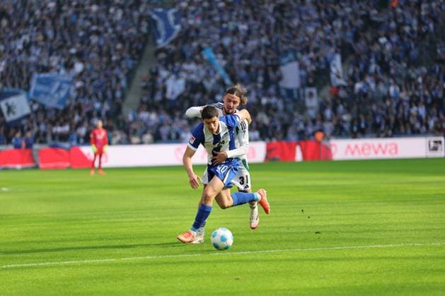 2 Soccer Bundesliga, Hertha BSC Schalke 04 Ibrahim Maza Hertha BSC Berlin 10 in a duel with Taylan Bulut Schalke 04 31 , during the match in the 2 Soccer Bundesliga, Hertha BSC Schalke 04 in Berlin, Olympiastadion, on 08 03 2025 DFB regulations prohibit any use of photographs as image sequences and or quasi video Copyright: xBEAUTIFULxSPORTS Frankex
