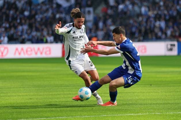 2 Soccer Bundesliga, Hertha BSC Schalke 04 Ibrahim Maza Hertha BSC Berlin 10 in a duel with Taylan Bulut Schalke 04 31 , during the match in the 2 Soccer Bundesliga, Hertha BSC Schalke 04 in Berlin, Olympiastadion, on 08 03 2025 DFB regulations prohibit any use of photographs as image sequences and or quasi video Copyright: xBEAUTIFULxSPORTS Frankex