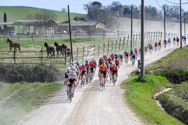 The pack of riders pictured in action during the men elite Strade Bianche one day cycling race, 213km from and to Siena, Italy on Saturday 08 March 2025. DIRKxWAEM  x114496188x