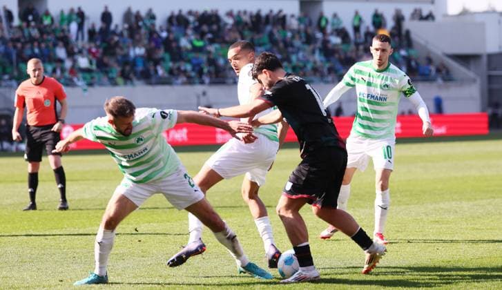 Fürth, 08 03 2025, Sportpark Ronhof, Soccer, 2 Bundesliga, 25 Matchday , SpVgg Greuther Fürth vs 1 FC Magdeburg , Pictured from left Simon Asta 2, Fuerth , Maximilian Dietz 33, Fuerth , Abu Bekir Ömer El Zein 14, Magdeburg , For editorial use only Only editorial use , DFB DFL regulations prohibit any use of photographs as image sequences and or quasi video , Picture Point