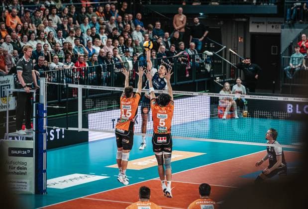 Volleyball Men Season 2024 2025 Volleyball Bundesliga VBL SVG Lüneburg vs Berlin Recycling Volleys 08 03 2025 Xander Wolf Wassenaar Ketrzynski 11 SVG Lüneburg against the block of Moritz Reichert 15 BERLIN RECYCLING Volleys and Nehemiah Mote 5 BERLIN RECYCLING Volleys Lüneburg LKH Arena Niedersachsen Germany