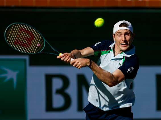 March 09, 2025 Ugo Humbert (FRA) returns a shot against Holger Rune (DEN) during the 2025 BNP Paribas Open at Indian Wells Tennis Garden in Indian Wells, California. Mandatory Photo Credit: CSM Indian Wells United States of America - ZUMAc04_ 20250309_zma_c04_196 Copyright: xCharlesxBausx