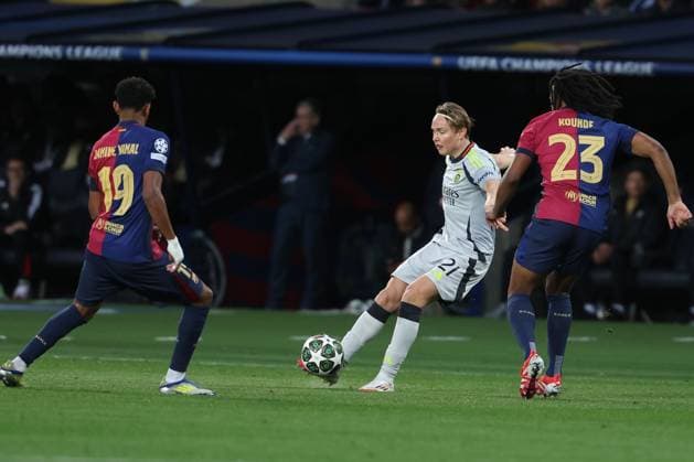 Barcelona 11 March 2025 Uefa Champions League phase 2024 25 Round of 16 FC Barcelona S L Benfica v l , Lamine Yamal FC Barcelona , Andreas Schjelderup S L Benfica , Jules Kounde FC Barcelona Copyright: JoaquimxFerreira