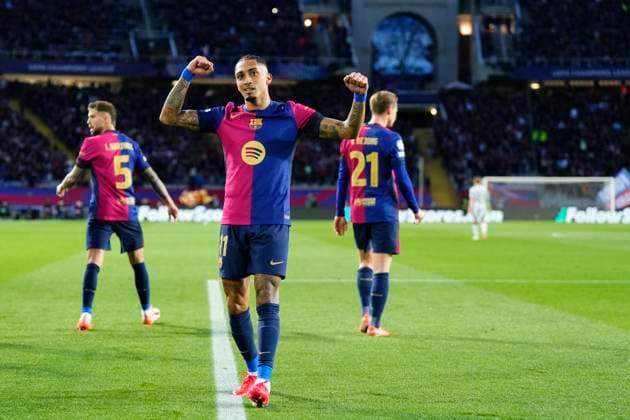 FC Barcelona, Barca v SL Benfica - UEFA Champions League 2024 25 Round of 16 Second Leg Raphinha right winger of Barcelona and Brazil celebrates after scoring his sides first goal during the UEFA Champions League 2024 25 Round of 16 Second Leg match between FC Barcelona and SL Benfica at Estadi Olimpic Lluis Companys on March 11, 2025 in Barcelona, Spain. Barcelona Spain  Copyright: xJosexBretonx originalFilename:bretonhernandez-fcbarcel250311_npby5.jpg