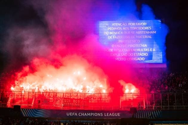 Spain-Football-Champions League FC Barcelona, Barca v SL Benfica in Barcelona, Spain. Barcelona, Spain, 11, March, 2025. Spain-Football-Champions League FC Barcelona v SL Benfica. Benfica supporters with light flares in the stands. Barcelona Olympic Stadium Lluis Companys Barcelona Spain