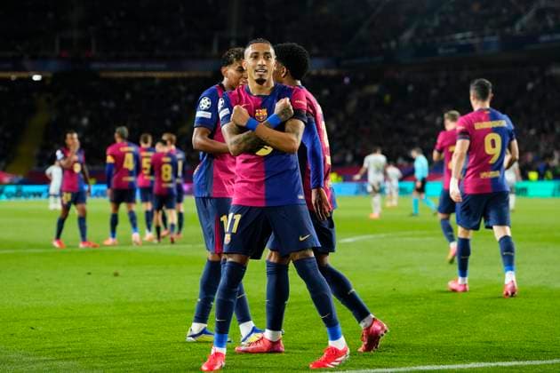 FC Barcelona, Barca v SL Benfica - UEFA Champions League 2024 25 Round of 16 Second Leg Raphinha right winger of Barcelona and Brazil celebrates after scoring his sides second goal during the UEFA Champions League 2024 25 Round of 16 Second Leg match between FC Barcelona and SL Benfica at Estadi Olimpic Lluis Companys on March 11, 2025 in Barcelona, Spain. Barcelona Spain  Copyright: xJosexBretonx originalFilename:bretonhernandez-fcbarcel250311_nptmQ.jpg