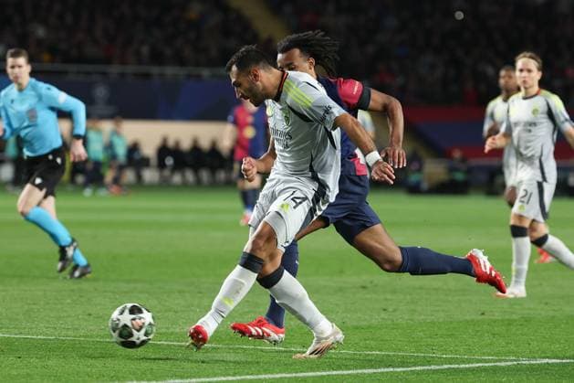 Barcelona 11 March 2025 Uefa Champions League phase 2024 25 Round of 16 FC Barcelona S L Benfica v l , Vangelis Pavlidis S L Benfica , Jules Kounde FC Barcelona duel, action, action, battles for the ball Copyright: JoaquimxFerreira