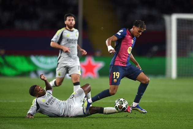 FC Barcelona, Barca v SL BENFICA OLIMPIC STADIUM LLUIS COMPANYS. MONTJUIC,BARCELONA.March 11,2025 FC BARCELONA vs SL BENFICA March 11,2025 Lamine Yamal (19) of FC Barcelona dribbles Florentino (61) of SL Benfica during the UEFA Champions League 2024 25 quarter-final second leg match between FC Barcelona and SL Benfica at Olimpic Stadium Lluis Companys of MontjuÃ¯c in Barcelona, Spain. Barcelona ESP Copyright: xS.xRosx