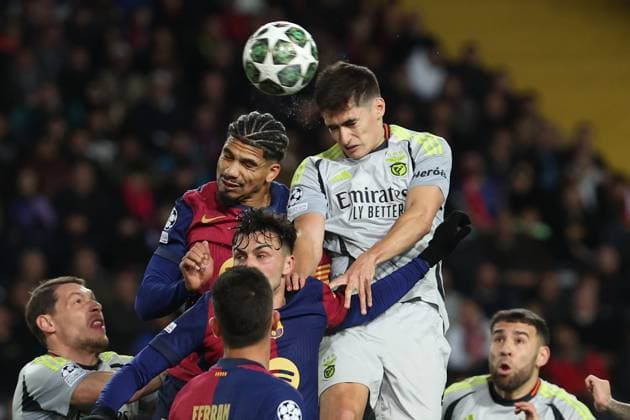 Barcelona 11 March 2025 Uefa Champions League phase 2024 25 Round of 16 FC Barcelona S L Benfica v l , Ronald Araujo FC Barcelona , Antonio Silva S L Benfica header, header duel Copyright: JoaquimxFerreira