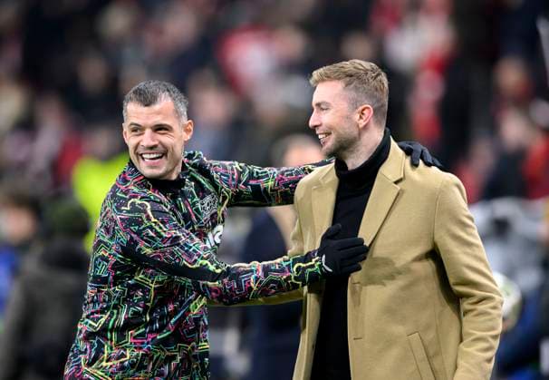 v l Granit XHAKA LEV , Christoph KRAMER TV expert welcome speech, Football Champions League, 1 8 final second leg, Bayer 04 Leverkusen LEV FC Bayern Muenchen M , on 11 03 2025 in Leverkusen Germany UEFA regulations prohibit any use of photographs as image sequences and or quasi video Â