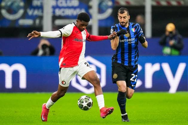 UEFA Champions League: FC Internationale Milan v Feyenoord Milan - Givairo Read of Feyenoord, Henrikh Mkhitaryan of FC Inter Milan during the 2nd leg of the round of 16 of new format of the Champions League 2024 2025. The match is set between FC Internationale Milan and Feyenoord at Giuseppe Meazza San Siro on 11 March 2025 in Milan, Italy. Copyright: xYannickxVerhoevenx
