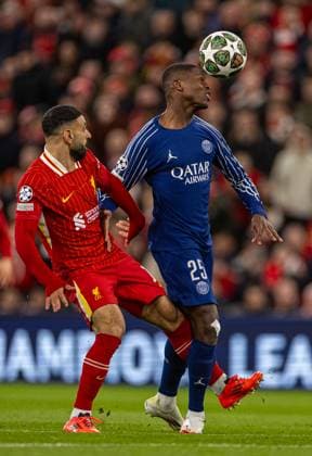 Football - UEFA Champions League - Round of 16 2nd Leg - Liverpool FC v Paris Saint-Germain FC LIVERPOOL, ENGLAND - Tuesday, March 11, 2025: Liverpool s Mohamed Salah (L) is challenged by Paris Saint-Germain s Nuno Mendes during the UEFA Champions League Round of 16 2nd Leg match between Liverpool FC and Paris Saint-Germain FC at Anfield. (Photo by David Rawcliffe Propaganda) LIVERPOOL Anfield MERSEYSIDE ENGLAND  Copyright: xDavidxRawcliffex P2025-03-11-Liverpool_PSG-28