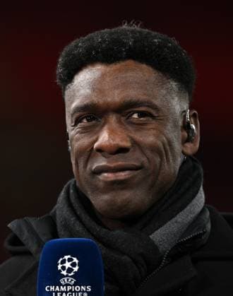 Liverpool, England, 11th March 2025. Clarence Seedorf during the UEFA Champions League match Liverpool vs Paris Saint Germain at Anfield, Liverpool. Picture credit should read: Cody Froggatt Sportimage EDITORIAL USE ONLY. No use with unauthorised audio, video, data, fixture lists, club league logos or live services. Online in-match use limited to 120 images, no video emulation. No use in betting, games or single club league player publications. SPI_CF_024_Man_City_Real_Madrid SPI-3739-0024