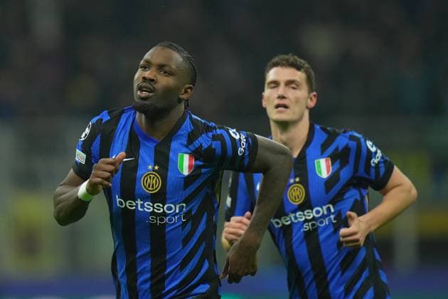 Inter Milan s Marcus Thuram celebrates after scoring 1-0 during the Uefa Champions League soccer match between Inter and Feyenoord at the San Siro Stadium in Milan, north Italy - Tuesday , March 11 , 2025. - Soccer .  Copyright: xSpada LaPressex