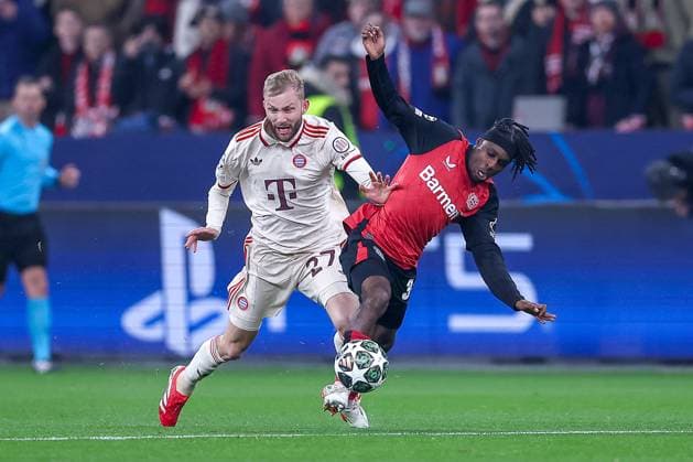 11 03 2025, Football, UEFA Champions League, Bayer 04 Leverkusen FC Bayern München, Round of 16 second leg, BayArena, Season 2024 2025 Konrad Laimer FC Bayern 27 in duel against Jeremie Frimpong Bayer04 Leverkusen 30 DFB regulations prohibit any use of photographs as image sequences and or quasi video Nordrhein Westfalen Germany