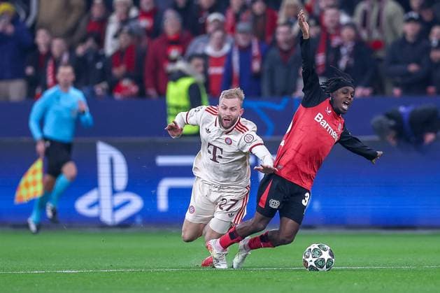 11 03 2025, Football, UEFA Champions League, Bayer 04 Leverkusen FC Bayern München, Round of 16 second leg, BayArena, Season 2024 2025 Konrad Laimer FC Bayern 27 in duel against Jeremie Frimpong Bayer04 Leverkusen 30 DFB regulations prohibit any use of photographs as image sequences and or quasi video Nordrhein Westfalen Germany
