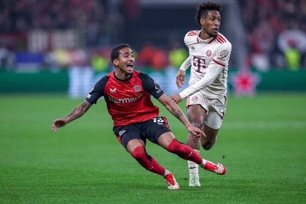 11 03 2025, Football, UEFA Champions League, Bayer 04 Leverkusen FC Bayern Munich, Round of 16 second leg, BayArena, Season 2024 2025 Arthur Bayer04 Leverkusen 13 in duel against Kingsley Coman FC Bayern 11 DFB regulations prohibit any use of photographs as image sequences and or quasi video North Rhine-Westphalia Germany
